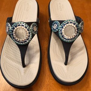 Crocs flip flops, size 9 women